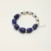 Lapis Lazuli & Cultured Pearl Bracelet photographed on a pale background