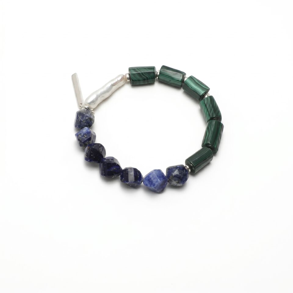 Malachite, Blue-Veined Stone & Cultured Pearl Bracelet photographed on a pale background