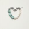 Amazonite & Cultured Pearl Bracelet photographed on a pale background