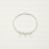 Clear Quartz, Topaz & Cultured Pearl Bracelet photographed on a pale background