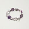 Clear Quartz, Amethyst & Cultured Pearl Bracelet photographed on a pale background