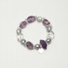 Clear Quartz, Amethyst & Cultured Pearl Bracelet photographed on a pale background