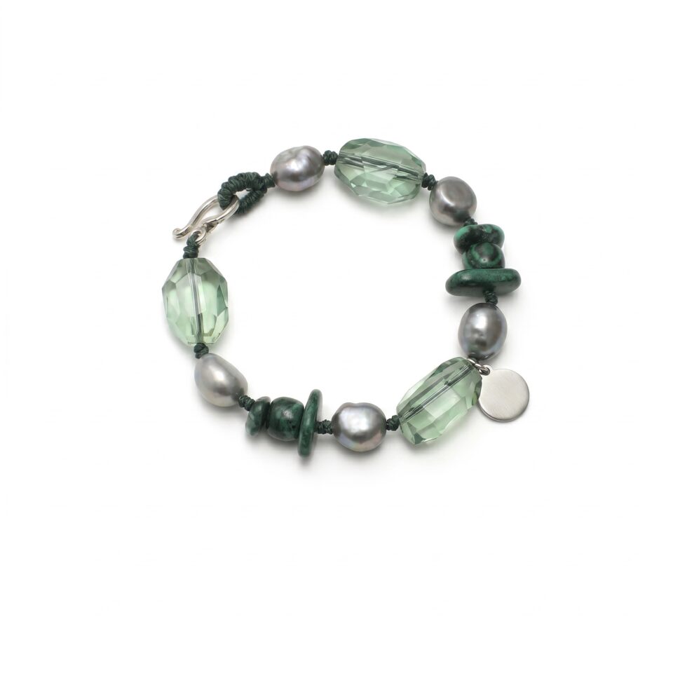 Malachite, Fluorite & Cultured Pearl Bracelet photographed on a pale background