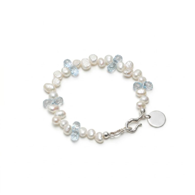 Topaz & Cultured Pearl Bracelet photographed on a pale background