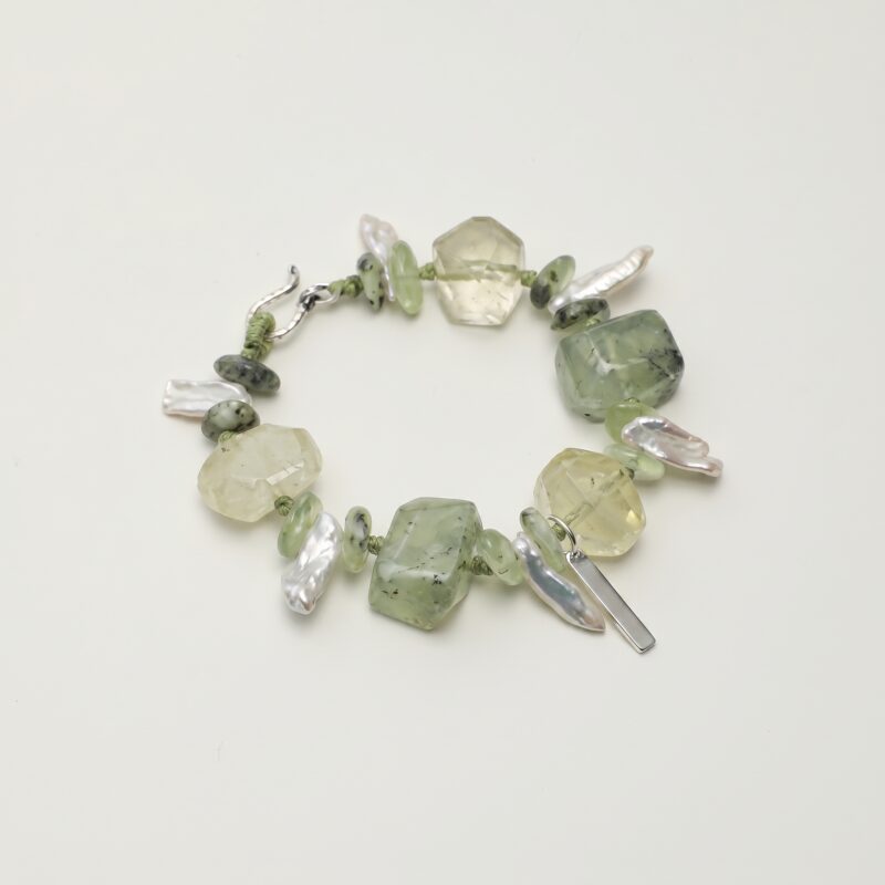 Citrine, Prehnite & Cultured Pearl Bracelet photographed on a pale background