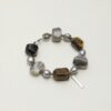 Tiger’s Eye, Agate & Cultured Pearl Bracelet photographed on a pale background