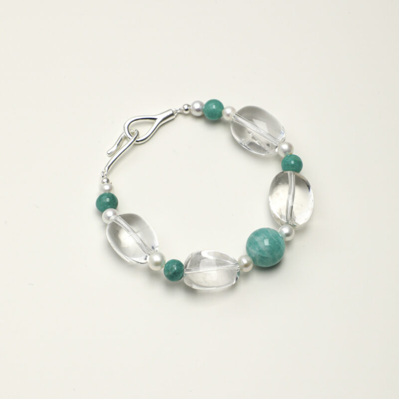 Clear Quartz, Amazonite & Pearl Bracelet - primary image Clear Quartz, Amazonite & Cultured Pearl Bracelet photographed on a pale background