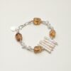Citrine & Cultured Pearl Bracelet photographed on a pale background
