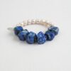 Lapis Lazuli & Cultured Pearl Bracelet photographed on a pale background