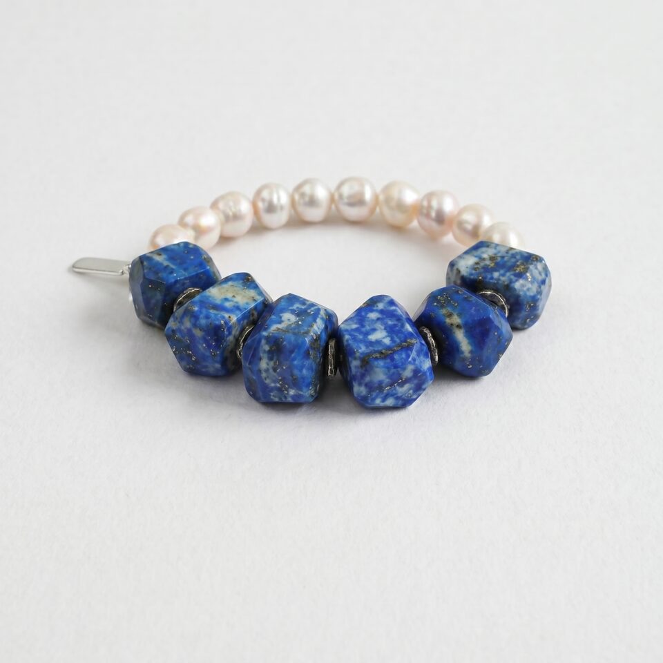 Lapis Lazuli & Cultured Pearl Bracelet photographed on a pale background