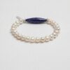 Lapis Lazuli & Cultured Pearl Bracelet photographed on a pale background