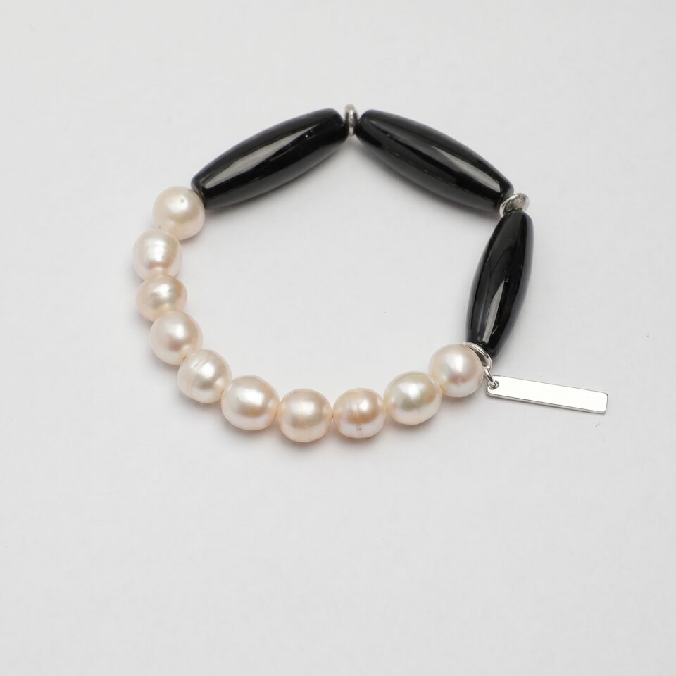 Agate & Cultured Pearl Bracelet photographed on a pale background