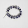 Double-Strand Blue-Veined Stone & Cultured Pearl Bracelet photographed on a pale background