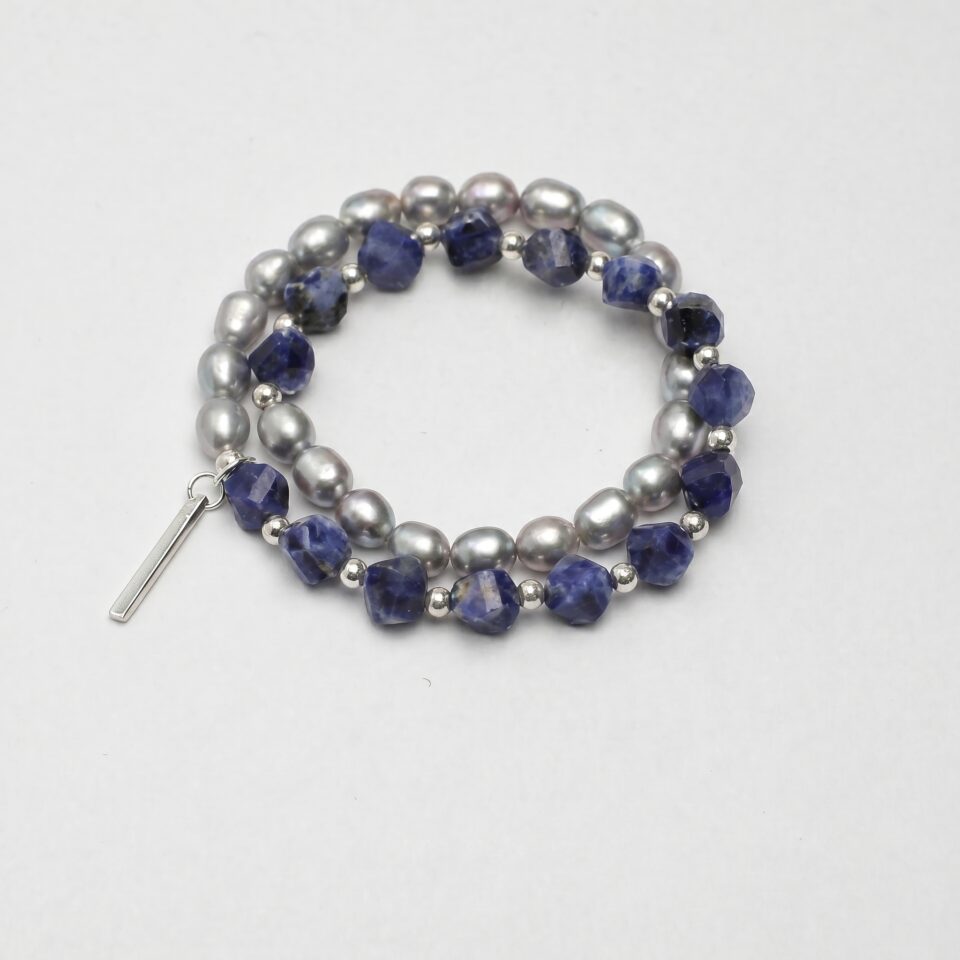 Double-Strand Blue-Veined Stone & Cultured Pearl Bracelet photographed on a pale background