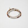 Triple-Strand Moonstone & Cultured Pearl Bracelet photographed on a pale background