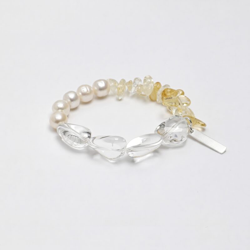 Clear Quartz & Citrine Bracelet photographed on a pale background