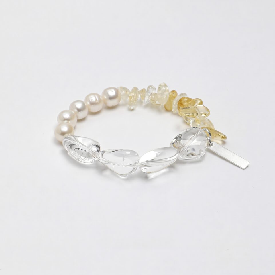 Clear Quartz & Citrine Bracelet photographed on a pale background