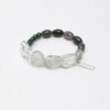 Malachite & Green Crystal Bracelet photographed on a pale background