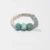 Moonstone, Amazonite & Blue Stone Bracelet photographed on a pale background