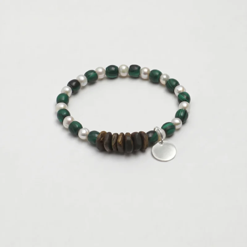 Malachite & Cultured Pearl Bracelet photographed on a pale background