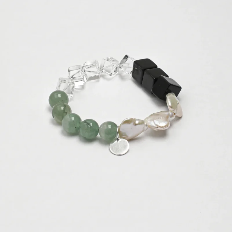 Agate, Aventurine & Cultured Pearl Bracelet photographed on a pale background
