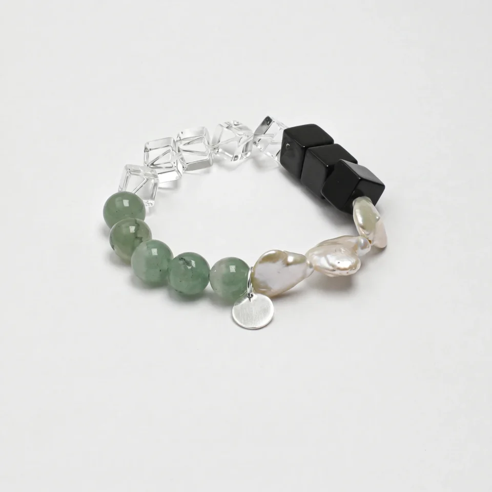 Agate, Aventurine & Cultured Pearl Bracelet photographed on a pale background