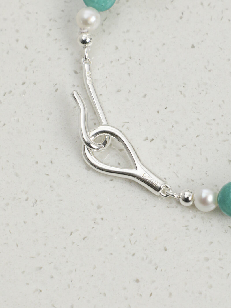 Aura & Qi detail 1J7A0990 Original detail view of Clear Quartz, Amazonite & Cultured Pearl Bracelet