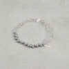 Aura & Qi detail 1J7A3396 Original detail view of Clear Quartz & Cultured Pearl Bracelet