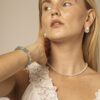 Aura & Qi lifestyle PURAERIA0939 Blue Stone & Cultured Pearl Bracelet in an original styled photograph