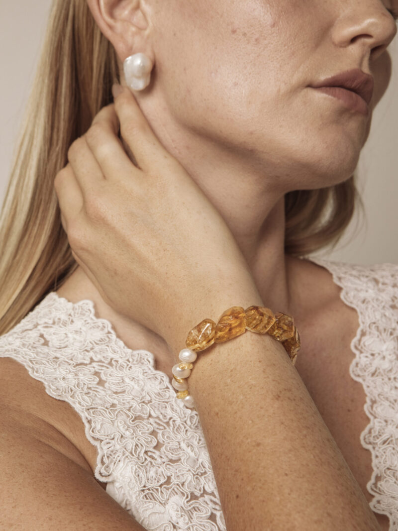 Aura & Qi lifestyle PURAERIA1031-1051 Citrine & Cultured Pearl Bracelet in an original styled photograph