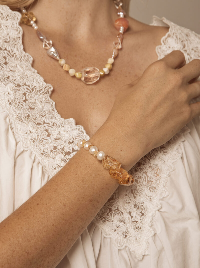 Aura & Qi lifestyle PURAERIA1037 Citrine & Cultured Pearl Bracelet in an original styled photograph