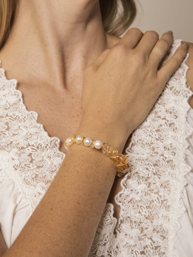 Aura & Qi lifestyle PURAERIA1053 Citrine & Cultured Pearl Bracelet in an original styled photograph