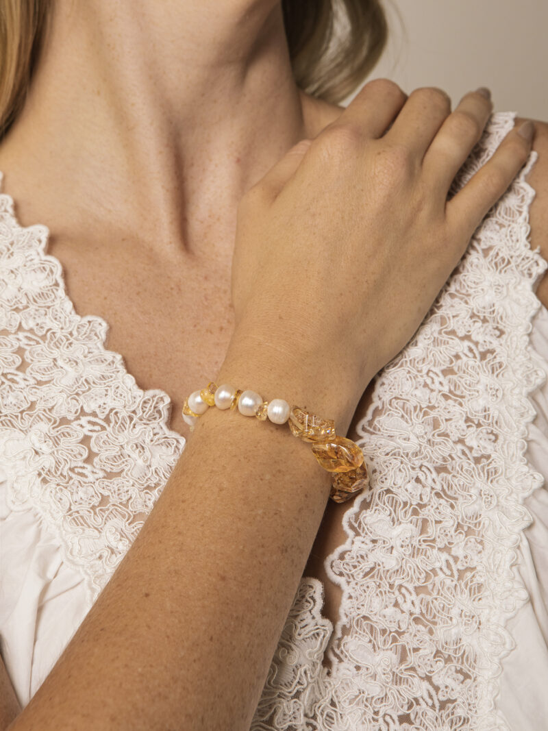 Aura & Qi lifestyle PURAERIA1053 Citrine & Cultured Pearl Bracelet in an original styled photograph