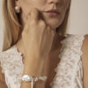 Aura & Qi lifestyle PURAERIA1128 - 副本 Clear Quartz & Cultured Pearl Bracelet in an original styled photograph