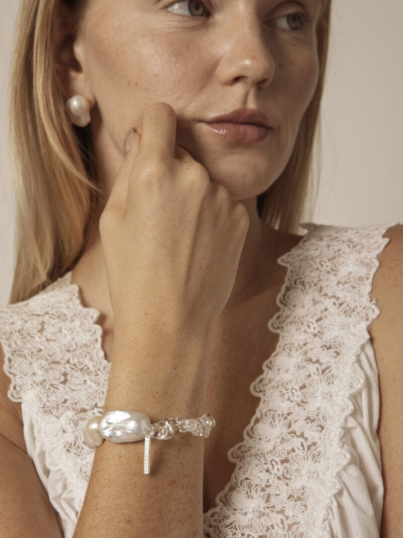 Aura & Qi lifestyle PURAERIA1128 - 副本 Clear Quartz & Cultured Pearl Bracelet in an original styled photograph