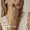Aura & Qi lifestyle PURAERIA1128 - 副本 Clear Quartz & Cultured Pearl Bracelet in an original styled photograph