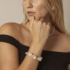 Aura & Qi lifestyle PURAERIA1133 - 副本 Clear Quartz & Cultured Pearl Bracelet in an original styled photograph