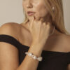 Aura & Qi lifestyle PURAERIA1133 - 副本 Clear Quartz & Cultured Pearl Bracelet in an original styled photograph