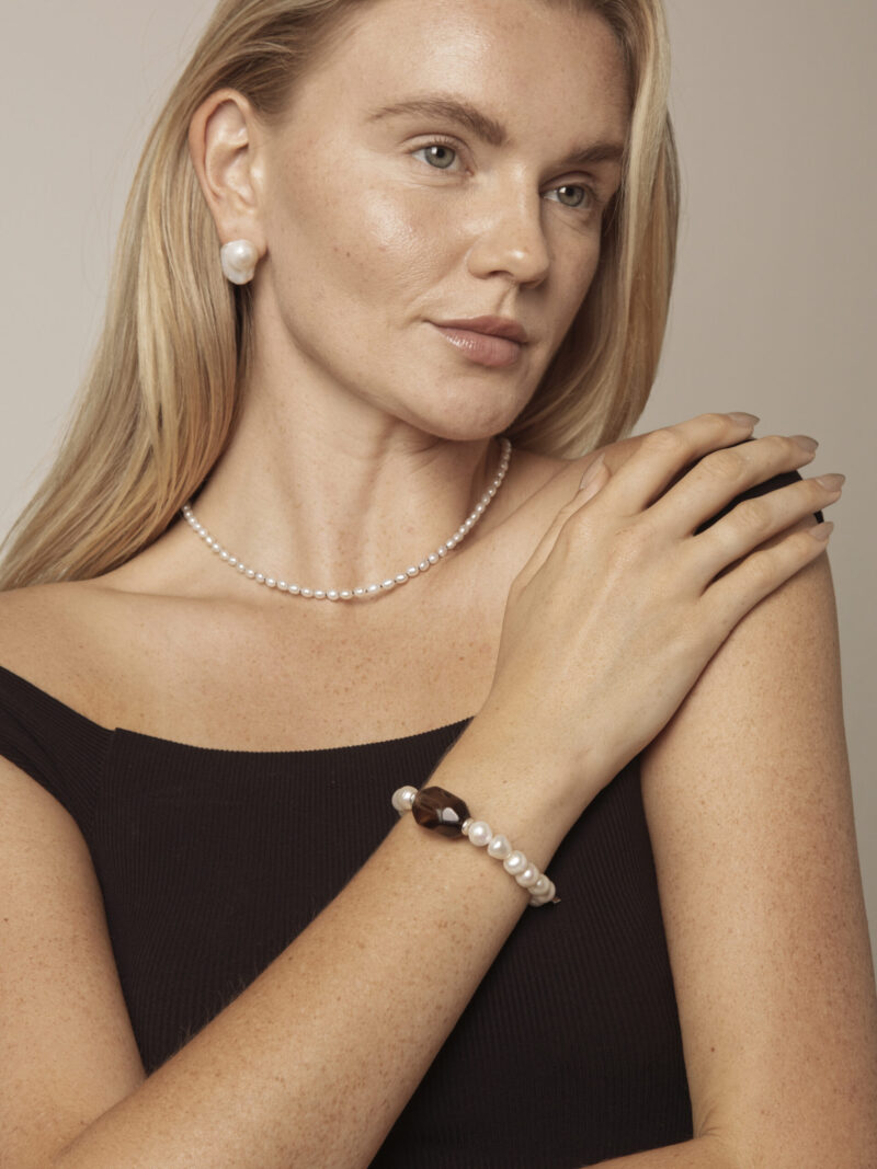 Aura & Qi lifestyle PURAERIA1167 Smoky Quartz & Cultured Pearl Bracelet in an original styled photograph