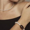 Aura & Qi lifestyle PURAERIA1180 Smoky Quartz & Cultured Pearl Bracelet in an original styled photograph