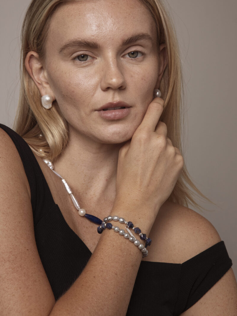 Double-Strand Blue-Veined Stone & Cultured Pearl Bracelet in an original styled photograph