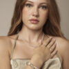 Clear Quartz, Green Crystal & Cultured Pearl Bracelet in an original styled photograph