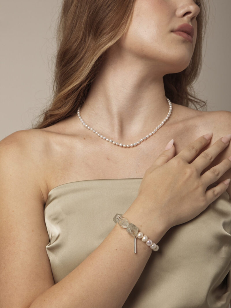 Clear Quartz, Green Crystal & Cultured Pearl Bracelet in an original styled photograph