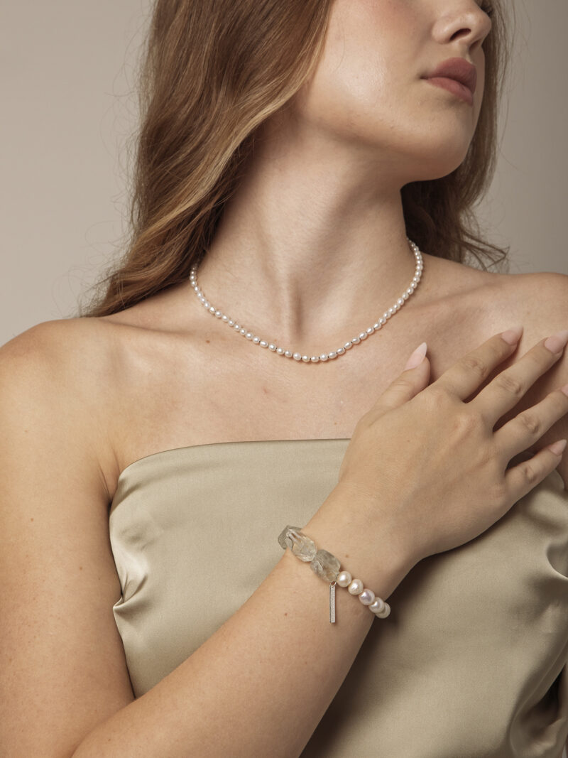 Clear Quartz, Green Crystal & Cultured Pearl Bracelet in an original styled photograph