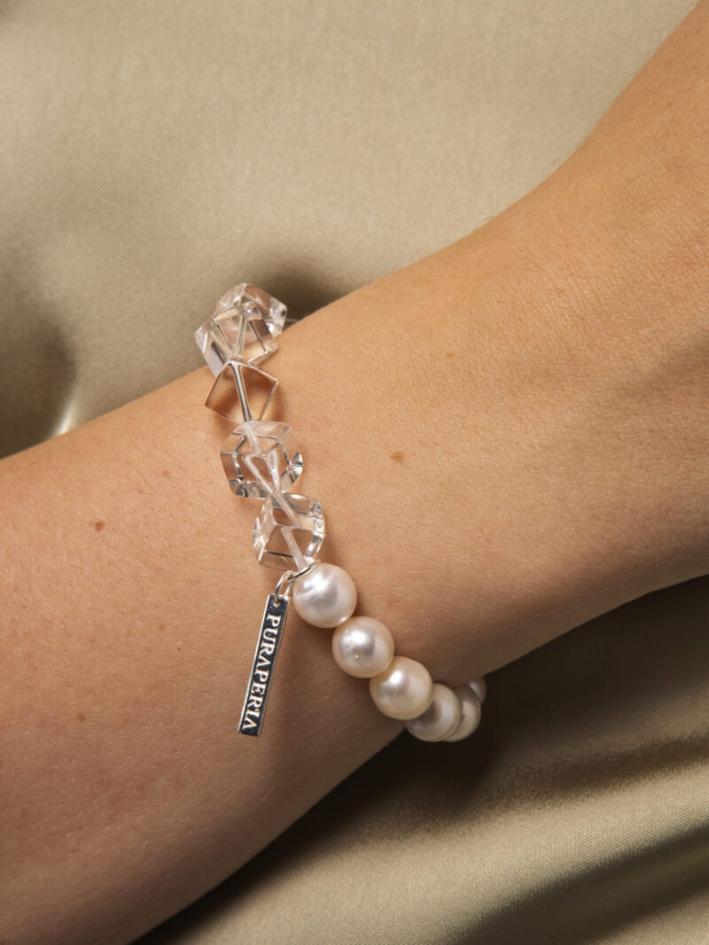 Aura & Qi lifestyle PURAERIA1462 Clear Quartz & Cultured Pearl Bracelet in an original styled photograph