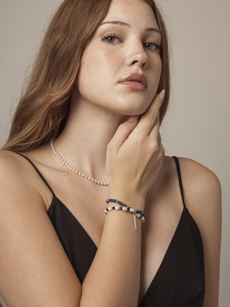 Double-Strand Lapis Lazuli, Tourmaline & Cultured Pearl Bracelet in an original styled photograph