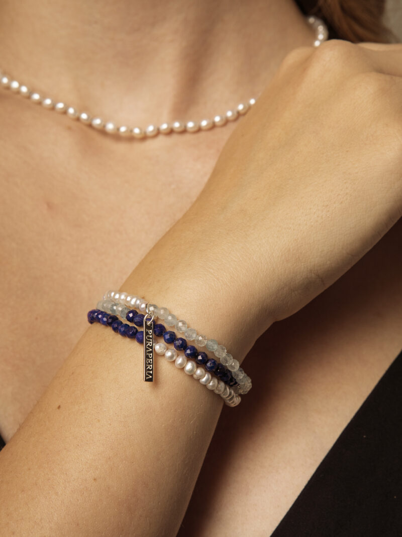 Triple-Strand Lapis Lazuli, Aquamarine & Cultured Pearl Bracelet in an original styled photograph