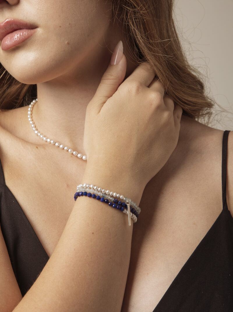 Triple-Strand Lapis Lazuli, Aquamarine & Cultured Pearl Bracelet in an original styled photograph