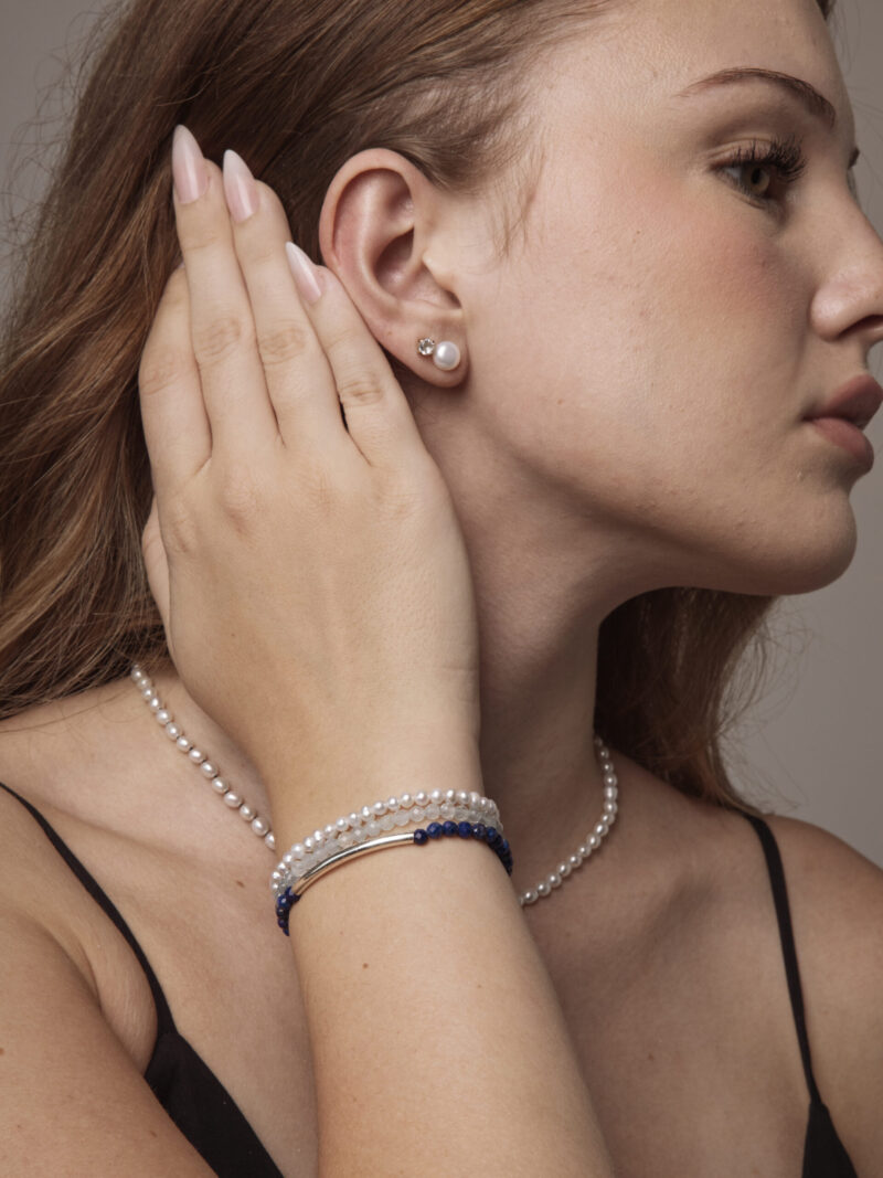 Triple-Strand Lapis Lazuli, Aquamarine & Cultured Pearl Bracelet in an original styled photograph