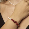 Red Coral & Cultured Pearl Bracelet in an original styled photograph